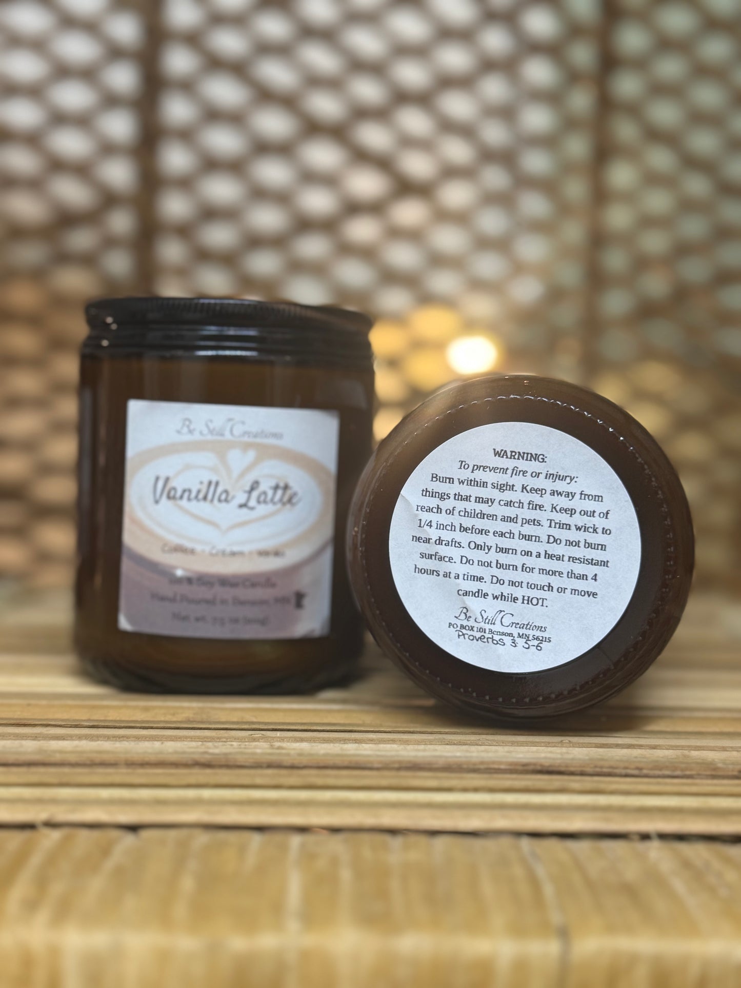 Vanilla Latte candle with label on a wooden surface