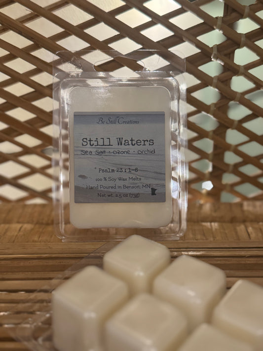 Close-up of Still Waters wax melts label showing sea salt, ozone, and orchid fragrance notes