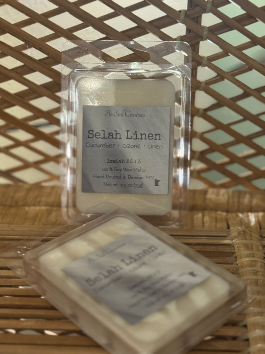 Close-up of Selah Linen wax melts label showing cucumber, ozone, and linen fragrance notes