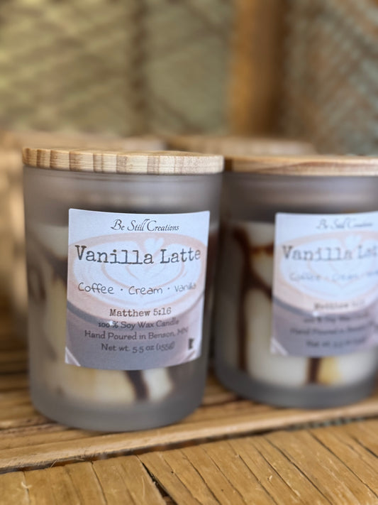 Two 'Vanilla Latte' candles with wooden lids on a wooden surface. Coffee candle. 100% Soy wax candle