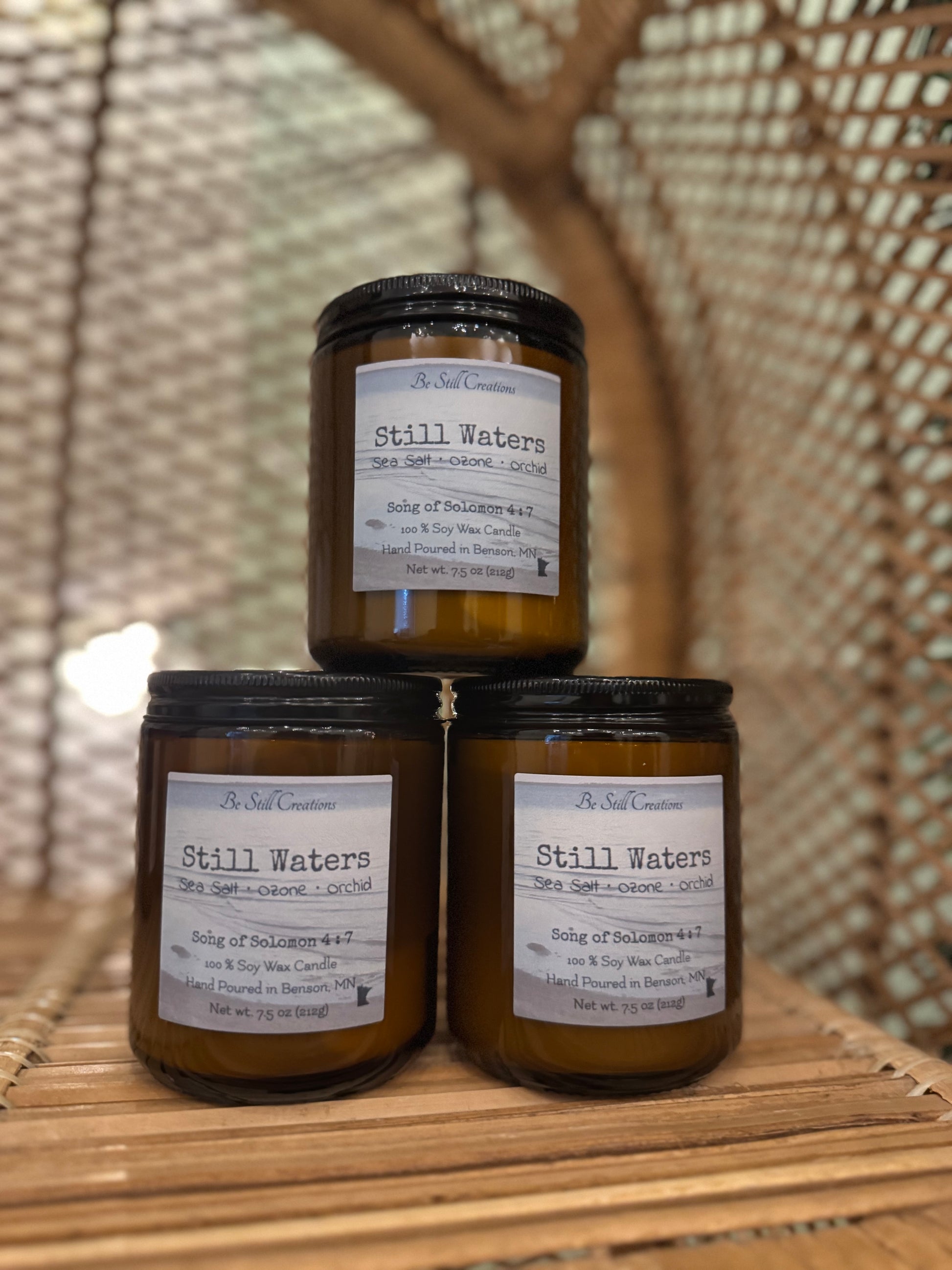 Still Waters candle detail view showing phthalate-free, pet-friendly soy wax formula, 38+ hour burn time