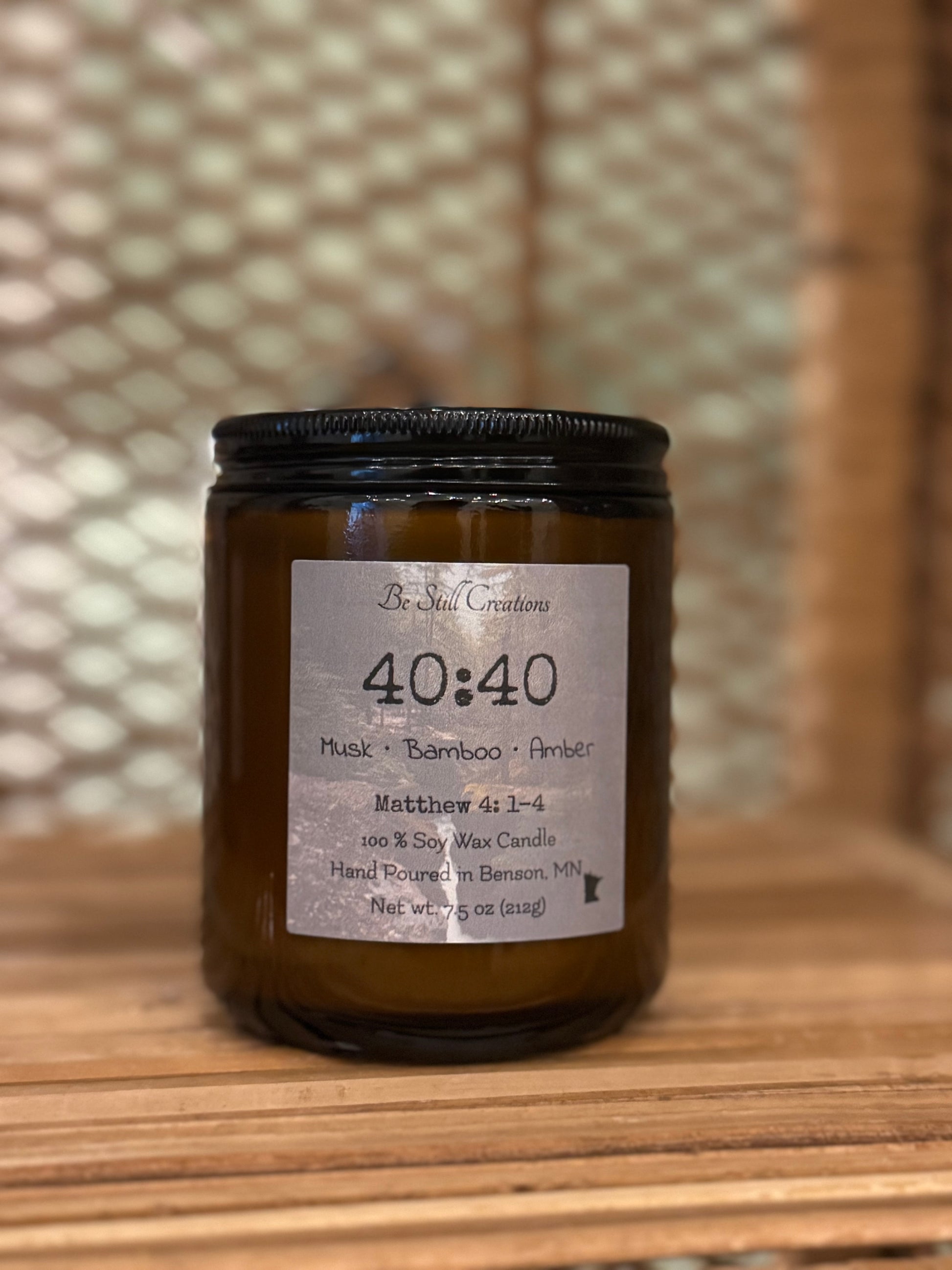Musk, bamboo, and amber scented soy candle