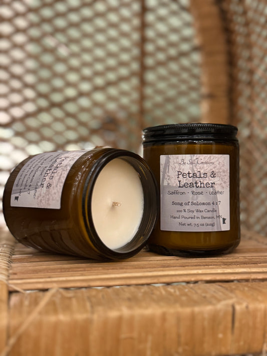 Close-up of Petals & Leather candle label showing saffron, rose, and leather fragrance notes