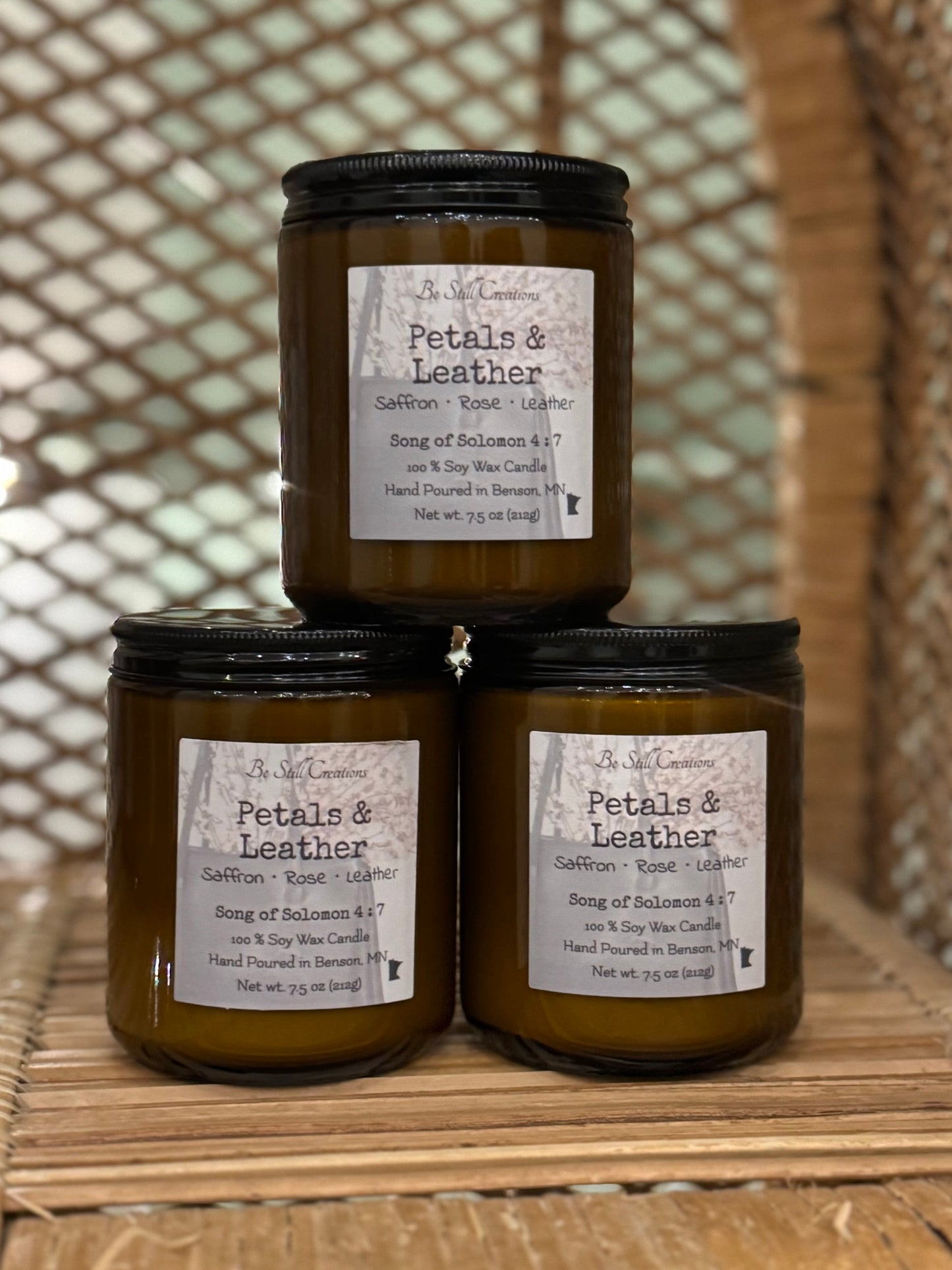 Petals & Leather candle detail view showing phthalate-free, pet-friendly soy wax formula