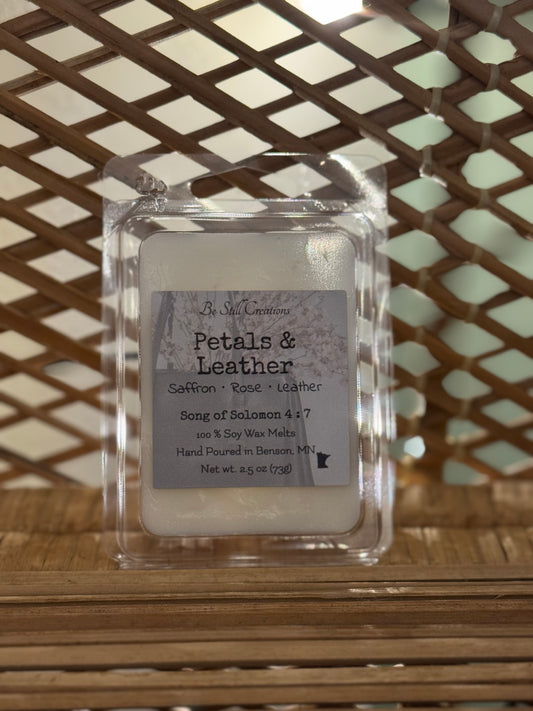 Close-up of Petals & Leather wax melts label showing saffron, rose, and leather fragrance notes