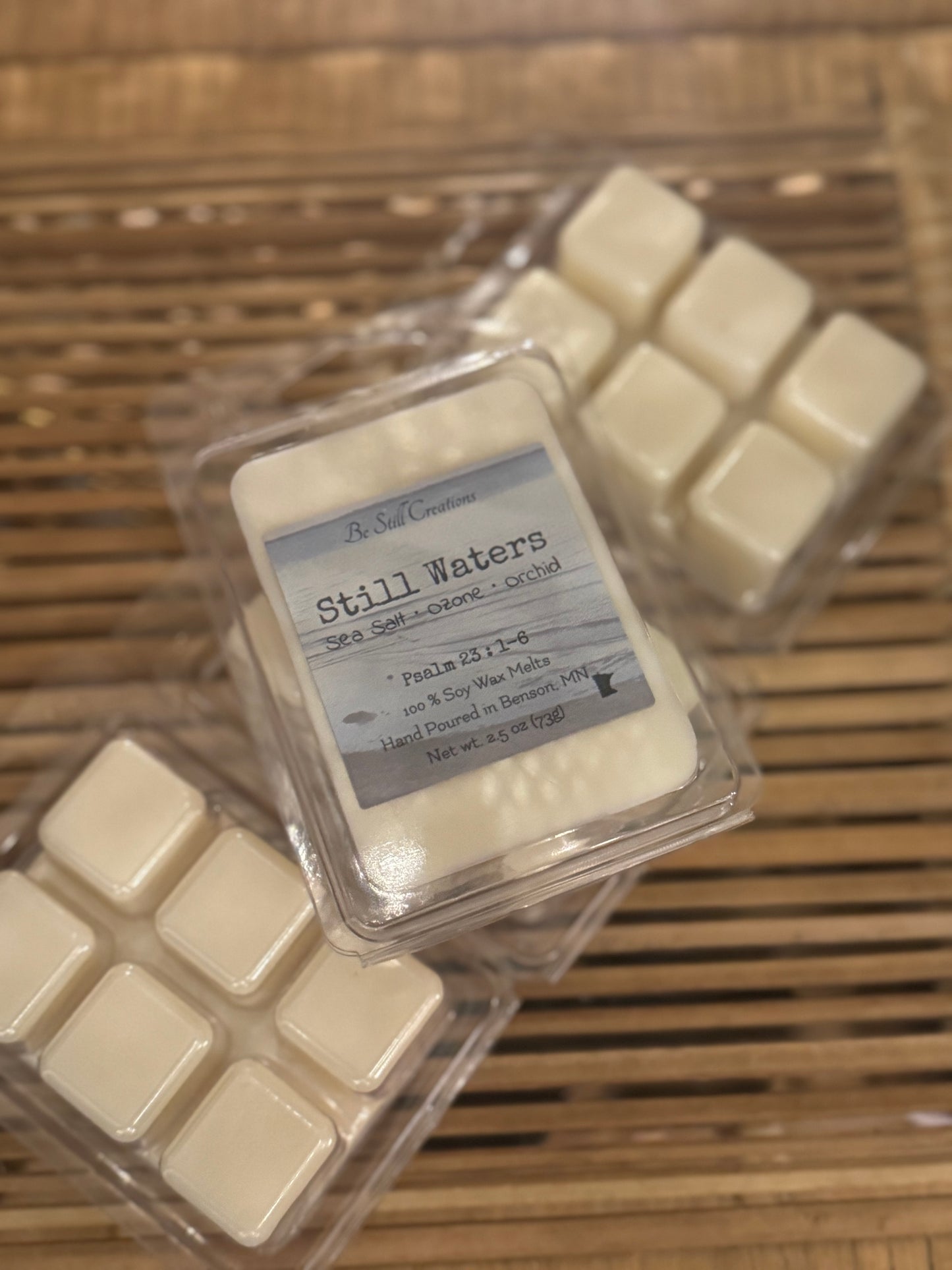 Still Waters soy wax melts in clear clamshell package, sea salt ozone orchid scent