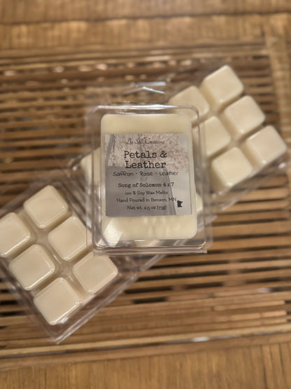 Petals & Leather soy wax melts in clear clamshell package, saffron rose leather scent