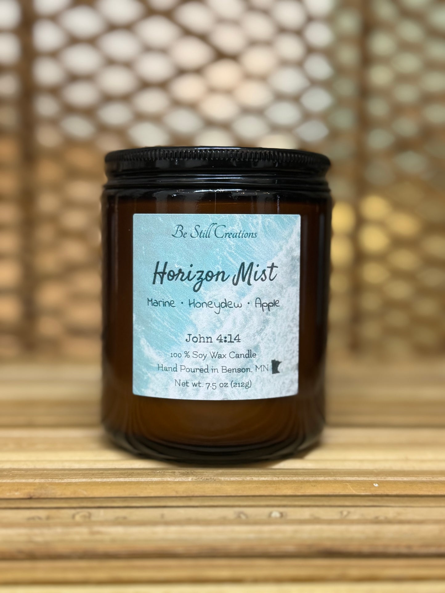 Marine, honeydew melon, and apple scented soy wax candle.