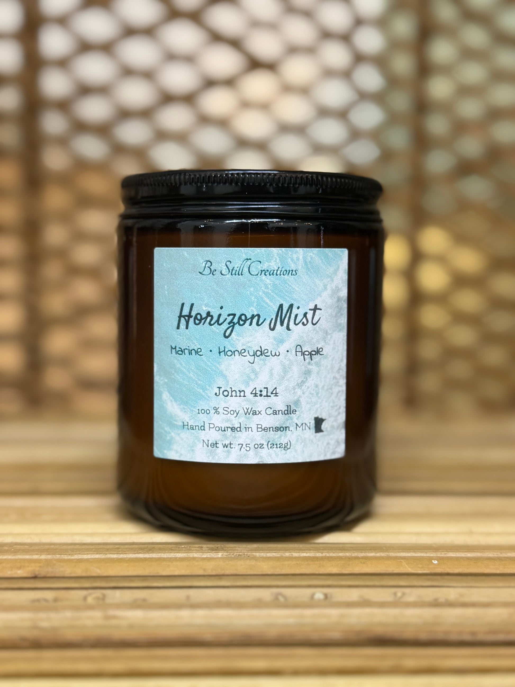 Marine, honeydew melon, and apple scented soy wax candle.